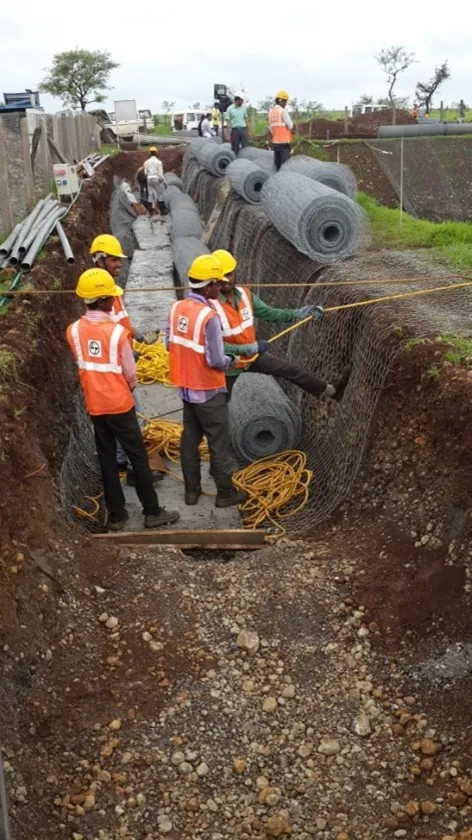 Slope protection works under construction at Birampura Pump House